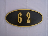 Sand Cast Aluminum Oval Address Plaque, Powder Coated Black, Trimmed with Gold Paint and Custom Numbered with Gold Painted Aluminum Numbers