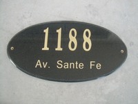 A Soild Polish Black Granite Oval Address Plaque with Gold Lettering