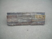 Split and Assembled Stone Pieces into a Ledge Rock Stone Wall Segment